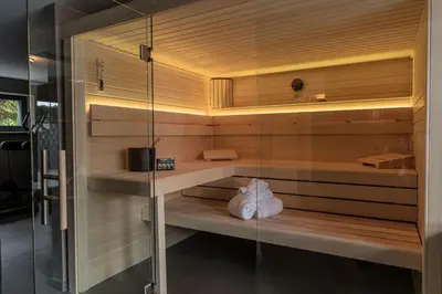 Ein Bett oder Betten in einem Zimmer der Unterkunft Wellness House Oase Spa mit Whirlpool