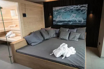 Ein Bett oder Betten in einem Zimmer der Unterkunft Wellness House Oase Spa mit Whirlpool
