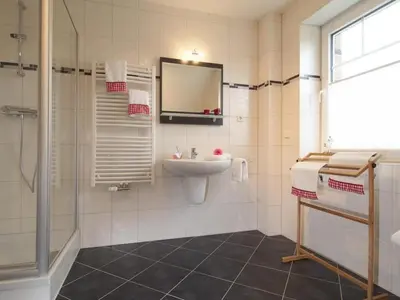 Ein Badezimmer in der Unterkunft Schneckenhaus Ferienhaus