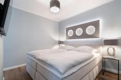 Ein Bett oder Betten in einem Zimmer der Unterkunft Sturmfrei Lounge 1