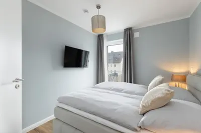 Ein Bett oder Betten in einem Zimmer der Unterkunft Sturmfrei Suite 1