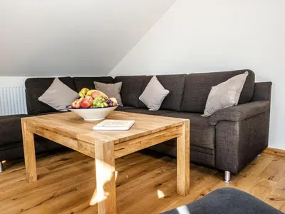 Ein Sitzbereich in der Unterkunft Ferienwohnung Meer und Muh